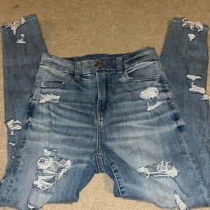 American eagle ripped blue jeans